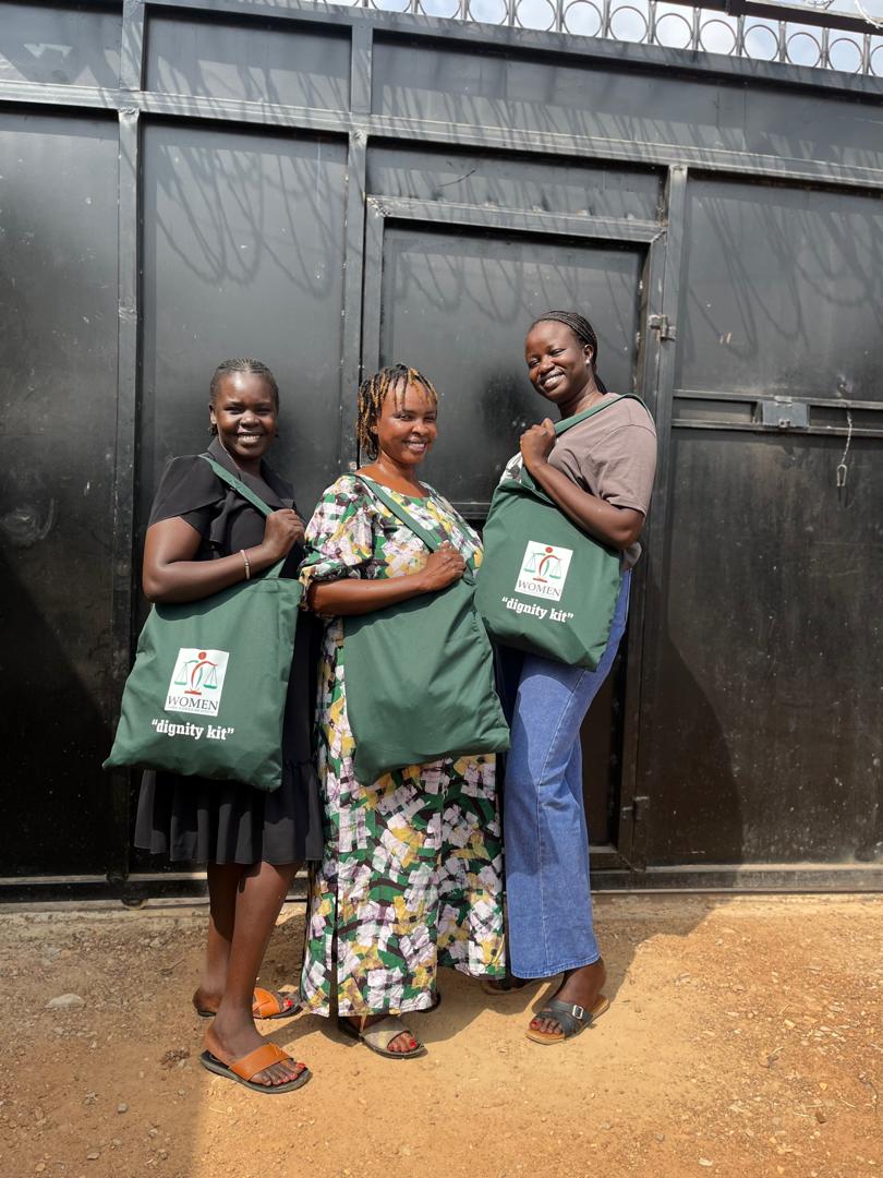 Community members with dignity kits